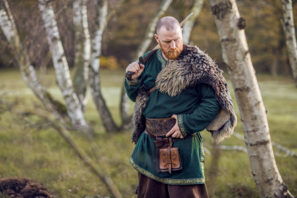 istock Russian viking warrior king in a forest 1323828277