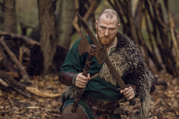 istock Russian viking warrior king in a forest 1323828424