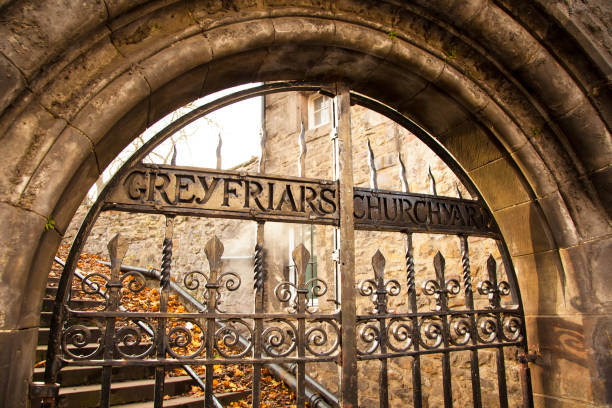Old entry gates to cemetery Greyfriars Kirkyard, Edinburg Old entry gates to Greyfriars cemetery in Edinburgh, Scotland kirkyard stock pictures, royalty-free photos & images