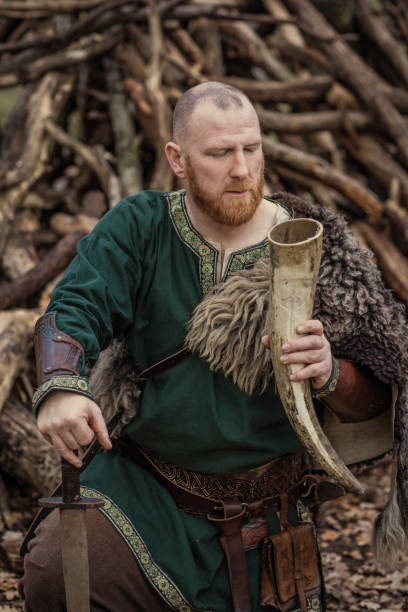 istock Russian viking warrior king in a forest 1323828555