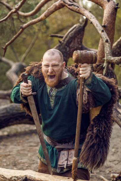 istock Russian viking warrior king in a forest 1323828733