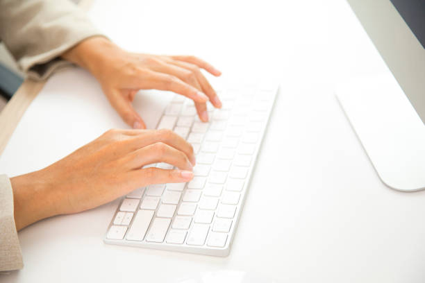 istock Close up woman hands on keyboard. 1323829587