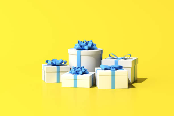 istock 3D rendering of gift box on yellow background. 1323829606