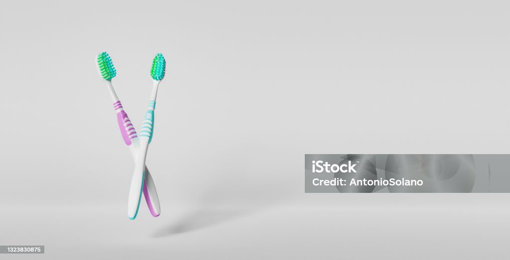 toothbrushes on white background toothbrushes floating in the air on white background with space for text. 3d render Toothbrush Stock Photo