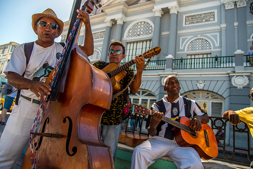 Santiago de Cuba/Cuba - February 2018: A street band playing on instruments in Santiago de Cuba