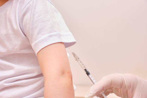 istock A doctor makes a vaccination to a child 1323832570
