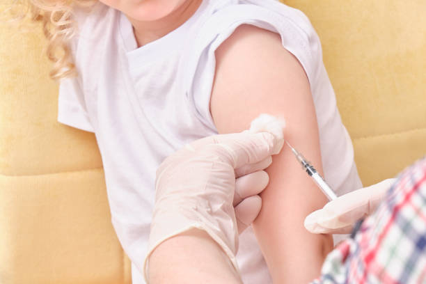istock A doctor makes a vaccination to a child 1323832577