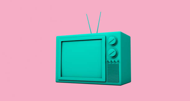 istock Close up green retro television isolated pink background. 1323832579