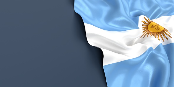 Partial Argentinian flag is waving on blue gray background. Horizontal composition with copy space. Easy to crop for all your social media and print sizes.