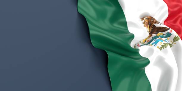istock Mexican Flag is Waving Against Blue Gray Surface 1323832699
