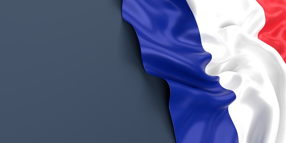 Partial French flag is waving on blue gray background. Horizontal composition with copy space. Easy to crop for all your social media and print sizes.