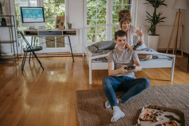 istock Couple playing video games 1323832999