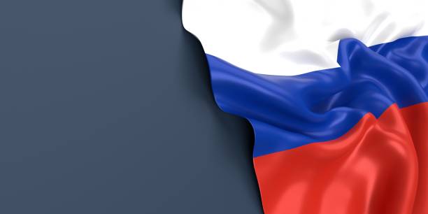 Russian Flag is Waving Against Blue Gray Surface Partial Russian flag is waving on blue gray background. Horizontal composition with copy space. Easy to crop for all your social media and print sizes. russian flag stock pictures, royalty-free photos & images