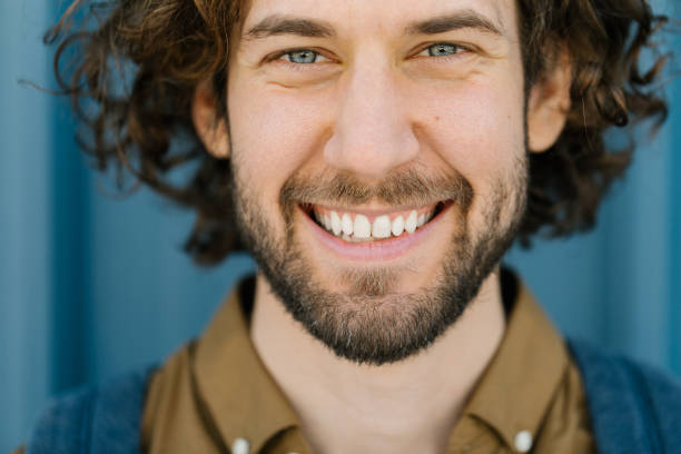 istock Handsome Caucasian young adult smiling at camera 1323834669