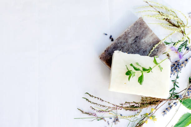 istock Natural skin care soap on a white background, top view, copy space 1323837321