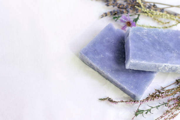istock Natural cosmetic lavender soap on a white background with copy space 1323837431