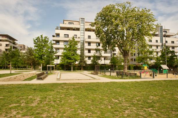 istock residential buildings with a park 1323838614