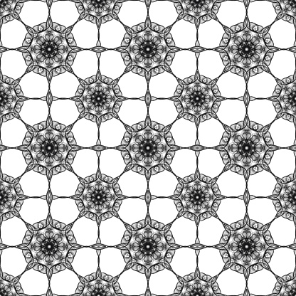 Seamless abstract geometric floral surface pattern in black and white colors with symmetrical form repeating horizontally and vertically. Use for fashion design, home decoration, wallpapers and gift packages.