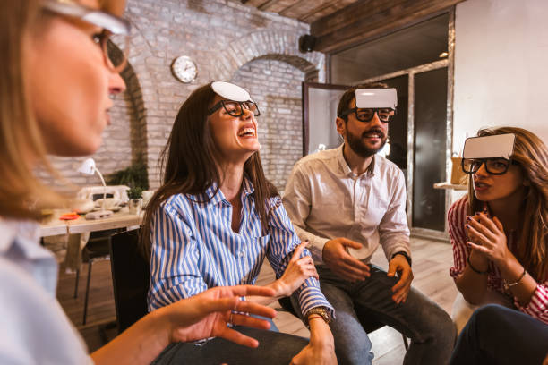 istock Business team having fun at corporate training, funny teambuilding activity, 1323840074