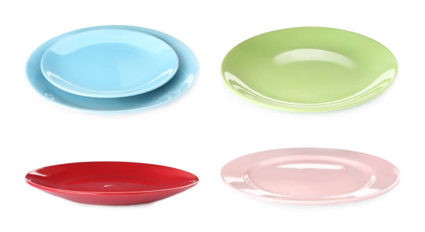 istock Set with colorful ceramic plates on white background. Banner design 1323840593