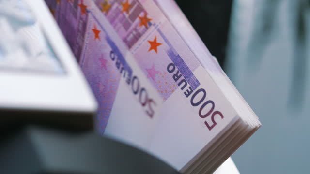Machine counter automatic calculates a large amount of Euro banknotes in 4K Slow motion 60fps