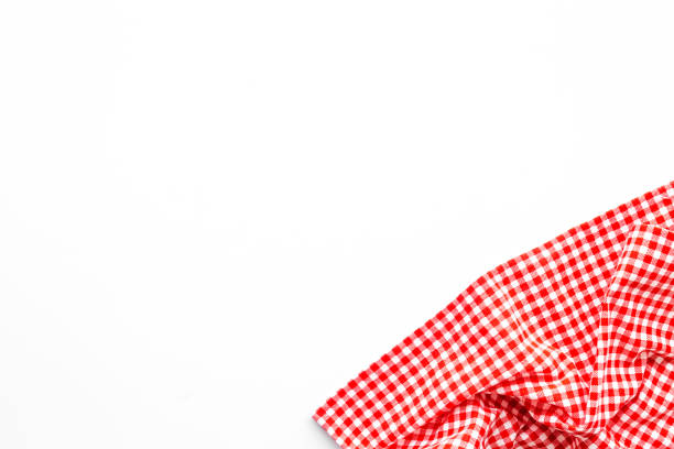 istock Red picnic cloth isolated on white, top view 1323846219