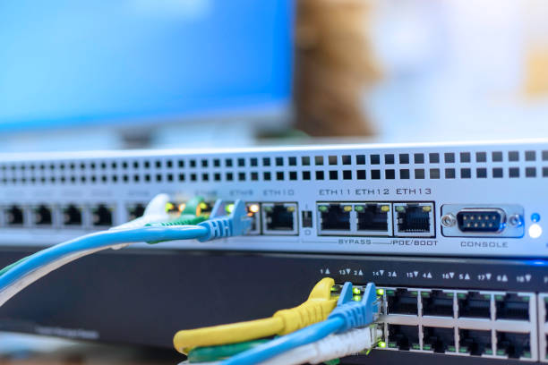 istock Close up, The network cables connected to switch hub. 1323847427