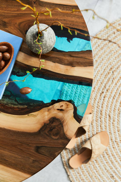 istock Minimalist composition of living room interior with designed rounded coffee table. Template 1323849027