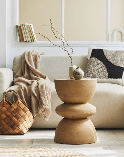 istock Minimalist composition of living room interior with neutral sofa and design coffee table. Template 1323849059
