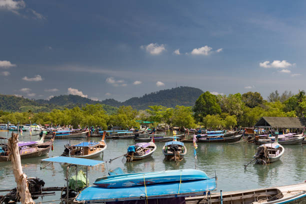 istock Longtail boats in a bay 1323850339