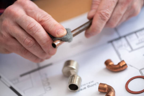 istock Plumber working on a copper tube 1323850545