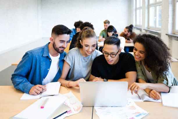 istock Classmates are discussing together in classroom 1323851659