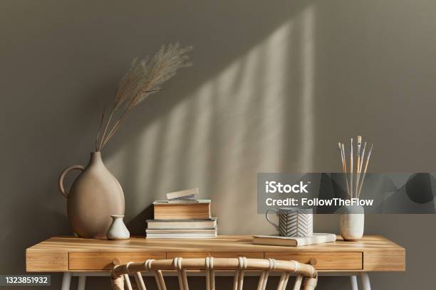 Interior Design Of Neutral Bohemian Living Room Interior With Stylish Desk Armchair Lamp Plant Decoration Office Supplies Clock Copy Space Notes And Personal Accessories Template Stock Photo - Download Image Now