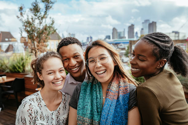 istock Group of multi ethnic millennial people 1323853424