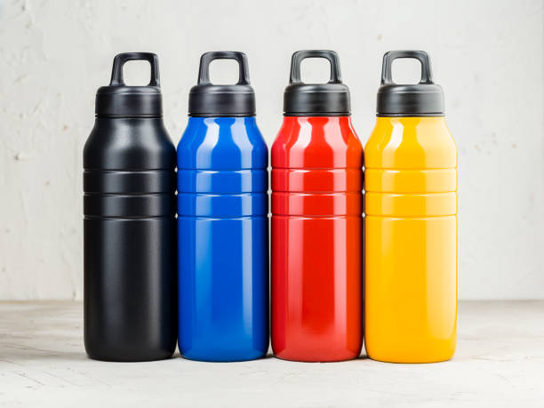 istock Four colorful reusable steel thermo water bottles 1323853679