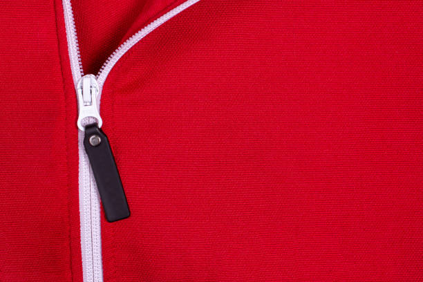 istock red textured sports jacket fabric with vertical white zipper 1323856294