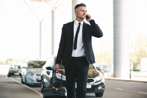 istock Confident mature businessman talking on mobile phone 1323857493