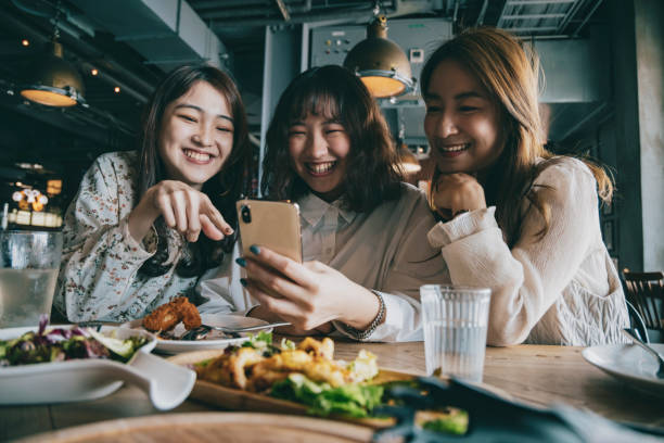 istock Dining with friends at the restaurant 1323861949