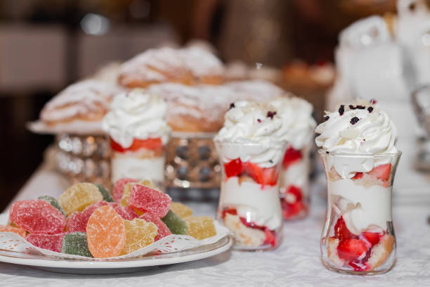 istock Stylish luxury decorated table with desserts for a happy couple's wedding celebration 1323863255