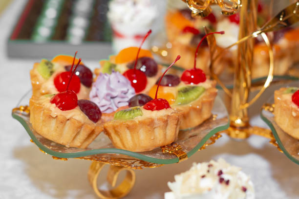 istock Stylish luxury decorated table with desserts for a happy couple's wedding celebration 1323863256