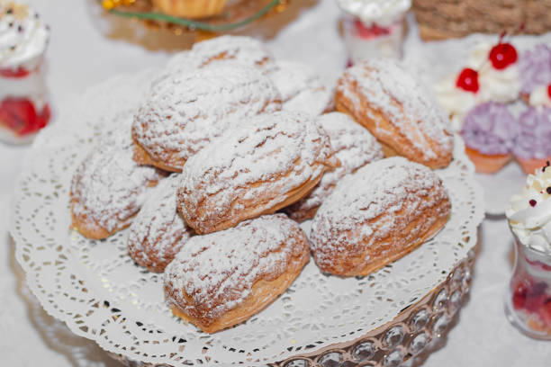istock Stylish luxury decorated table with desserts for a happy couple's wedding celebration 1323863280