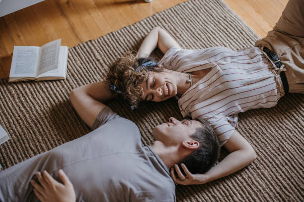 istock Couple lying on the floor 1323863299