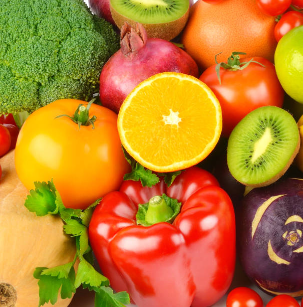 istock Beautiful bright background from various vegetables and fruits. 1323863771