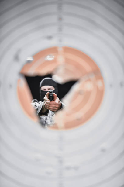 istock Soldier Enduring Tough Pistol Practice Session On Gun Field 1323866994