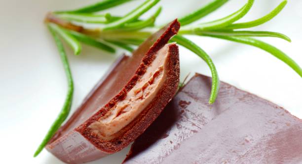sweet chocolate filled with rosemary - close up cookie gourmet food imagens e fotografias de stock