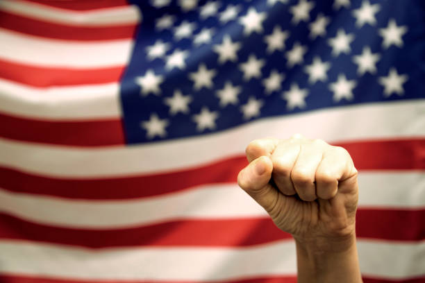 istock American flag with fist 1323869805