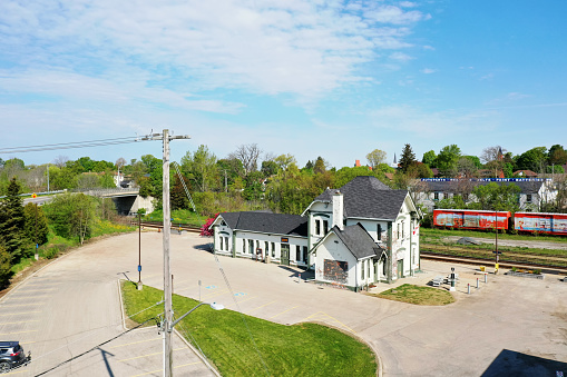 An aerial of an old train station in Woodstock, Ontario, Canada. Built in 1885 for the CNR, it is used by ViaRail and has a Historic Designation.