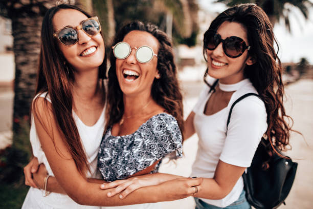 istock friends walking in the city 1323871061