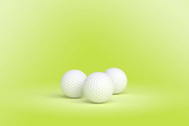 istock 3 golf balls with red flag on green background 1323872072