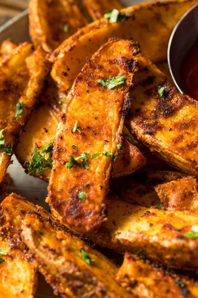 istock Homemade Spicy Oven Fried Potato Wedges 1323872254